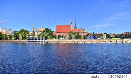 Szczecin, Poland. 16 July 2025. Historical capital of Western Pomerania, lies on the bank of the Odra River. Landscape view on city and the Odra River. Szczecin, Poland. 16 July 2025. Historical capital of Western Pomerania, lies on the bank of the Odra River. Landscape view on city and the Odra River. 130792895