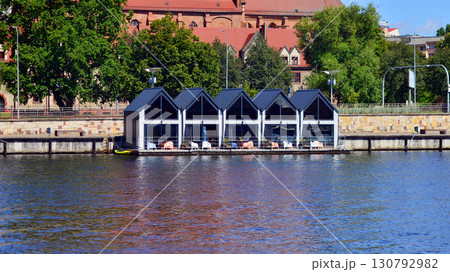 Szczecin, Poland. 16 July 2025. Historical capital of Western Pomerania, lies on the bank of the Odra River. Landscape view on city and the Odra River. Szczecin, Poland. 16 July 2025. Historical capital of Western Pomerania, lies on the bank of the Odra River. Landscape view on city and the Odra River. 130792982