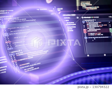 programming code on multiple monitors with a glowing purple digital effect, representing futuristic software development. 130794322