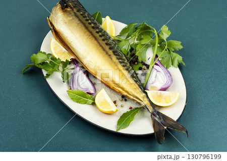 Hot-smoked headless mackerel. 130796199