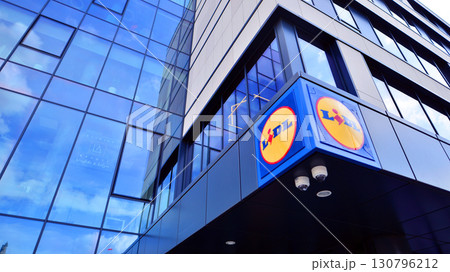 Szczecin, Poland. 16 July 2025. Urban landscape. Neon sign with the inscription: Lidl. 130796212