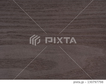 Dark gray ash veneer wooden surface, marked by nature's brushstrokes of elegance Dark gray ash veneer wooden surface, marked by nature's brushstrokes of elegance 130797798