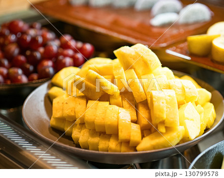 Salad bar with mix fruits in buffet at restaurant 130799578