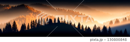 Dramatic misty mountain landscape with a layered forest silhouetted against the glowing sky at sunset Dramatic misty mountain landscape with a layered forest silhouetted against the glowing sky at sunset 130800848