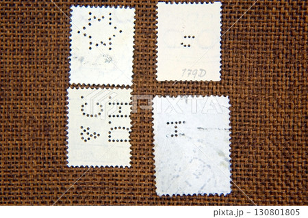 Exploring the Intricate World of Postage Stamps Perfins in a Captivating Philatelic Collection Exploring the Intricate World of Postage Stamps Perfins in a Captivating Philatelic Collection 130801805