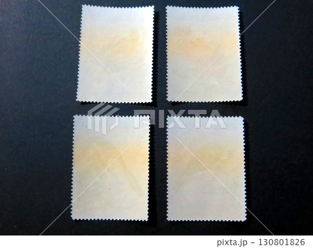 Unique Collection of Vintage Postage Stamps Showcasing the Reverse Side for Philatelic Enthusiasts 130801826