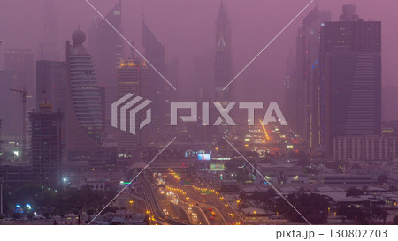Dubai cityscape during sand storm day to night timelapse Dubai cityscape during sand storm day to night timelapse 130802703