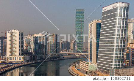 Aerial view of new modern skyscrapers in luxury Dubai timelapse Aerial view of new modern skyscrapers in luxury Dubai timelapse 130802731
