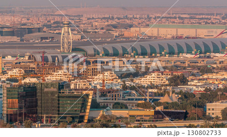 View of modern buildings in luxury Dubai city at sunset aerial timelapse 130802733