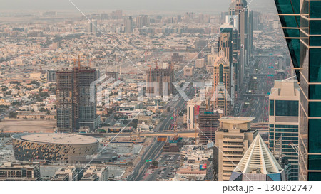 Skyscrapers on Sheikh Zayed Road and DIFC aerial timelapse in Dubai, UAE. 130802747