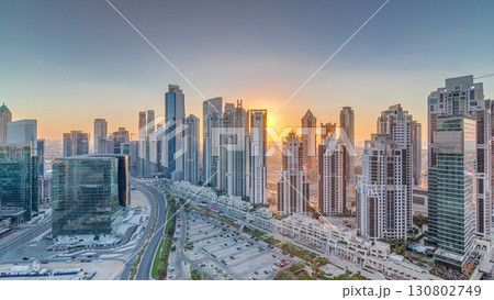Modern residential and office complex with many towers aerial timelapse at Business Bay, Dubai, UAE. Modern residential and office complex with many towers aerial timelapse at Business Bay, Dubai, UAE. 130802749