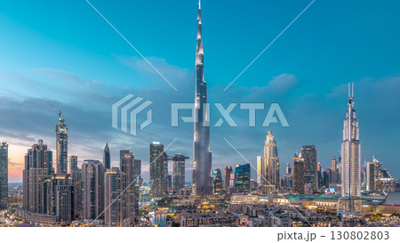 Dubai Downtown skyline day to night timelapse with Burj Khalifa and other towers panoramic view from the top in Dubai 130802803