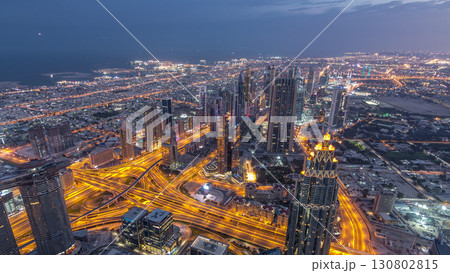 Downtown of Dubai night timelapse before sunrise. Aerial view with towers and skyscrapers 130802815