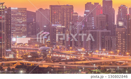 Dubai Marina skyscrapers and golf course day to night timelapse, Dubai, United Arab Emirates Dubai Marina skyscrapers and golf course day to night timelapse, Dubai, United Arab Emirates 130802846