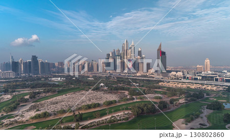 Dubai Marina skyscrapers and golf course morning timelapse, Dubai, United Arab Emirates Dubai Marina skyscrapers and golf course morning timelapse, Dubai, United Arab Emirates 130802860
