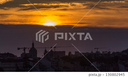 Lisbon at sunset aerial view of city centre with orange sky at Autumn evening timelapse, Portugal 130802945