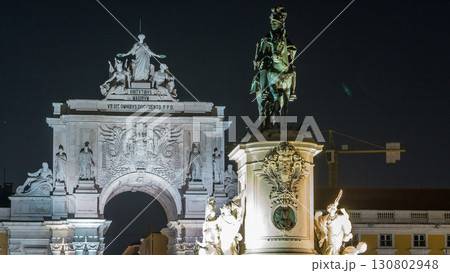Triumphal arch at Rua Augusta and bronze statue of King Jose I at Commerce square night timelapse in Lisbon, Portugal. Triumphal arch at Rua Augusta and bronze statue of King Jose I at Commerce square night timelapse in Lisbon, Portugal. 130802948