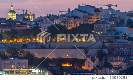 Lisbon panorama after sunset aerial view of city centre with red roofs at autumn day to night timelapse, Portugal Lisbon panorama after sunset aerial view of city centre with red roofs at autumn day to night timelapse, Portugal 130802954