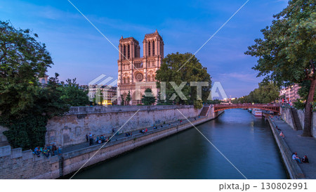 Front view of Notre Dame De Paris cathedral day to night timelapse after sunset. Front view of Notre Dame De Paris cathedral day to night timelapse after sunset. 130802991