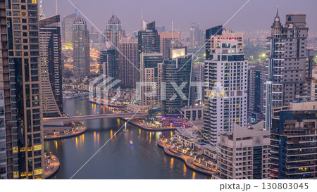 Beautiful aerial top view day to night transition timelapse of Dubai Marina canal Beautiful aerial top view day to night transition timelapse of Dubai Marina canal 130803045