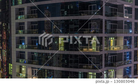 Scenic glowing windows of skyscrapers at evening timelapse 130803046