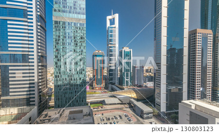 Skyline view of the buildings of Sheikh Zayed Road and DIFC all day timelapse in Dubai, UAE. 130803123