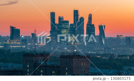 Cityscape night to day timelapse, residential buildings, park areas, group of Moscow City skyscrapers Cityscape night to day timelapse, residential buildings, park areas, group of Moscow City skyscrapers 130803173
