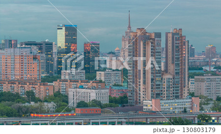 Aerial view to cityscape skyline with World Trade Center towers and hotel Ukraine day to night timelapse in Moscow, Russia. 130803179