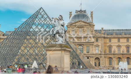 Louis XIV statue at the Louvre museum timelapse in Paris, France. 130803240
