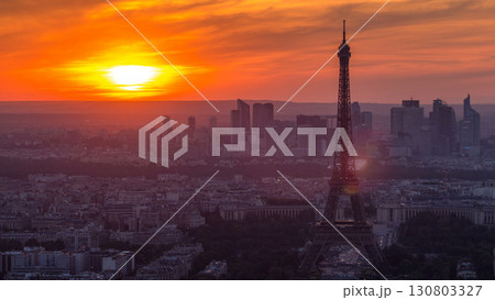 Panorama of Paris at sunset timelapse. Eiffel tower view from montparnasse building in Paris - France Panorama of Paris at sunset timelapse. Eiffel tower view from montparnasse building in Paris - France 130803327