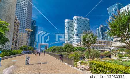 Skyscrapers of La Defense timelapse hyperlapse - Modern business and residential area in the near suburbs of Paris, France. 130803334
