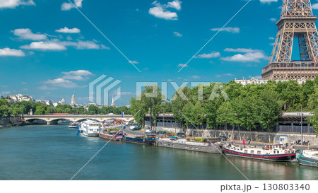 The Eiffel tower timelapse from bridge over the river Seine in Paris 130803340