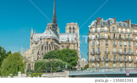 Seine river and Notre Dame de Paris back side timelapse. Famous symbols of Paris Seine river and Notre Dame de Paris back side timelapse. Famous symbols of Paris 130803391