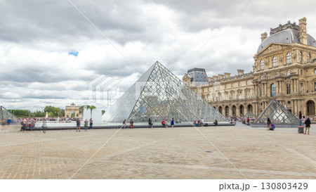 The large glass pyramid and the main courtyard of the Louvre Museum timelapse hyperlapse. Paris, France The large glass pyramid and the main courtyard of the Louvre Museum timelapse hyperlapse. Paris, France 130803429