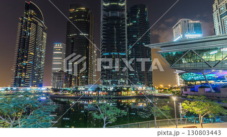 Residential buildings in Jumeirah Lake Towers timelapse hyperlapse in Dubai, UAE. Residential buildings in Jumeirah Lake Towers timelapse hyperlapse in Dubai, UAE. 130803443