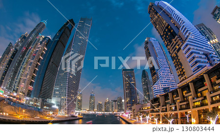 Dubai Marina towers and canal in Dubai day to night timelapse Dubai Marina towers and canal in Dubai day to night timelapse 130803444