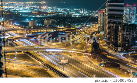 Aerial top view at night timelapse of Dubai Marina in Dubai, UAE Aerial top view at night timelapse of Dubai Marina in Dubai, UAE 130803455