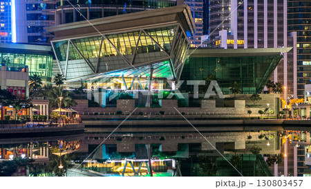Residential buildings in Jumeirah Lake Towers timelapse in Dubai, UAE. 130803457