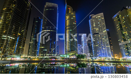 Residential buildings in Jumeirah Lake Towers timelapse hyperlapse in Dubai, UAE. 130803458