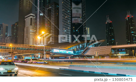 Downtown Dubai towers night timelapse. View of Sheikh Zayed road with skyscrapers. Downtown Dubai towers night timelapse. View of Sheikh Zayed road with skyscrapers. 130803475