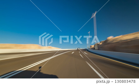 Curvy road through the Jebel Hafeet road timelapse hyperlapse, Al Ain, United Arab Emirates Curvy road through the Jebel Hafeet road timelapse hyperlapse, Al Ain, United Arab Emirates 130803478