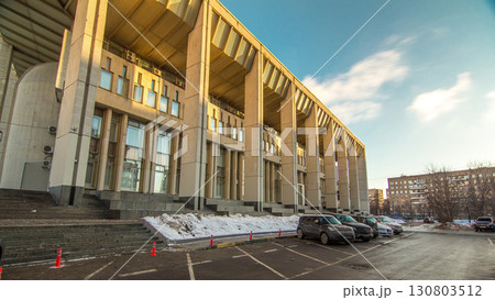 Timelapse hyperlapse of the facade and entrance to the Moscow Youth Palace during winter. 130803512