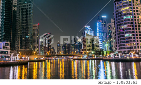Dubai Marina towers and canal in Dubai night timelapse Dubai Marina towers and canal in Dubai night timelapse 130803563
