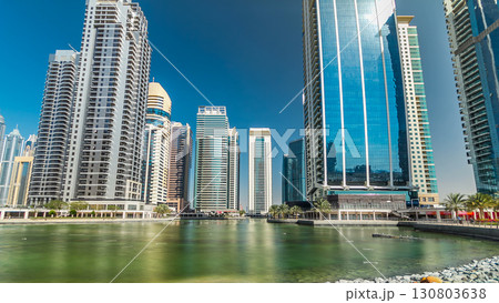Residential buildings in Jumeirah Lake Towers timelapse hyperlapse in Dubai, UAE. 130803638