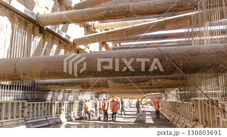 A large huge ditch pit tunnel timelapse at the construction site of the underground metro station line. A large huge ditch pit tunnel timelapse at the construction site of the underground metro station line. 130803691
