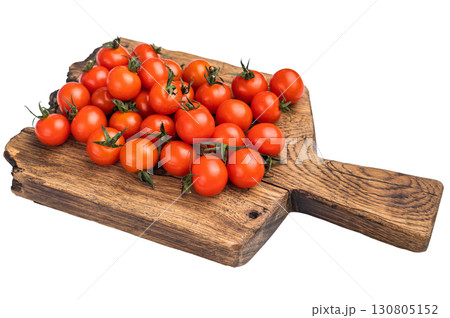 Juicy mini tomatoes, showcasing their sweet taste and glossy skin. Ideal for garnishing, roasting, or adding a pop of color to meals. isolated on white background. top view Juicy mini tomatoes, showcasing their sweet taste and glossy skin. Ideal for garnishing, roasting, or adding a pop of color to meals. isolated on white background. top view 130805152