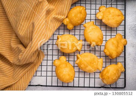 Korean pancake Bungeoppang, Fish shaped Waffle with sweet red bean filling. white background. top view 130805512