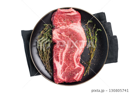 Chuck eye roll steak, raw marbled beef meat with herb for cooking isolated on white background Chuck eye roll steak, raw marbled beef meat with herb for cooking isolated on white background 130805741