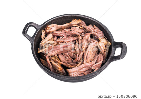 Savory pulled beef brisket served in a skillet, dipping creating an appealing and mouthwatering culinary scene isolated on white background. top view 130806090