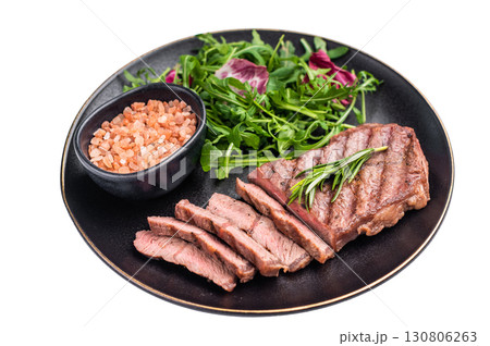 Grilled Top blade steak with salad, beef shoulder meat on a plate isolated on white background. top view 130806263